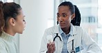 Doctor, patient consultation and black woman with pills for health support, recovery or healthcare recommendation. Medicine, container or person explain pharmaceutical, supplements or prescription