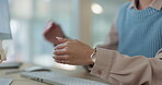 Talking, desk and hands of a person with a computer for a video call, communication or consulting. Closeup, office and an employee with a gesture for a discussion, meeting or speaking on a pc