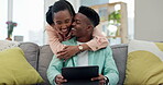 Black couple, tablet and hug in living room sofa with love, social media and smile in a home. Couch, online shopping and website scroll of young people together with happy embrace and laugh from meme