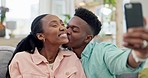 Happy, couple, and kiss for selfie in home on video call, profile picture or broadcast social media post. Young man, woman and black people smile for photography of memory, love and laughing together