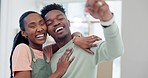 Face, couple and smile with keys in new home, moving together and property investment of real estate. Portrait, black people and kiss with hug to celebrate house, financial security and mortgage loan