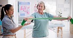 Resistance band, exercise and senior woman in physiotherapy with equipment, therapist or help in rehabilitation training. Osteoporosis, strength or stretching in workout for physiotherapist in clinic