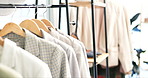 Fashion, clothing rack and empty boutique store for retail shopping, accessory or outfit choice. Room, shop or line of clothes, suits or fashionable attire for purchase, buying or discount sale