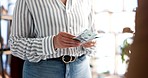 People, hands and counting money at checkout for payment, purchase or buying product at boutique store. Closeup of person, customer or small business owner paying with cash, paper or dollars at shop