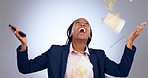 Happy black woman, phone and money rain in celebration, winning or good news against a studio background. Excited African female person with smartphone, cash and business success in financial freedom