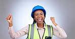 Happy black woman, architect and dancing in celebration, winning or success against a studio background. Portrait of excited African female person, engineer or contractor with fist pump in promotion