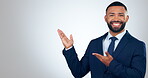 Business man, face and presentation mockup for investment deal, information and company advertising in studio. Corporate or african worker pointing to space, opportunity or news on a white background