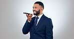 Voice note, business and professional man with phone on call for networking, speaker audio and talk in studio on white background. Communication, person and smile with smartphone for chat and career