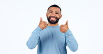 Happy man, hands and thumbs up in approval, agreement or positive mindset against a white studio background. Portrait of male person smile in happiness with like emoji, yes sign or OK on mockup space