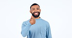 Happy man, fashion and thumbs up in approval, agreement or positive mindset against a white studio background. Portrait of male person in happiness with like emoji, yes sign or okay on mockup space