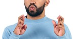 Anxiety, hands and man with fingers crossed in studio for hope, good luck or wish on white background. Finger, emoji and nervous male model with optimistic sign for feedback, vote or lotto results 