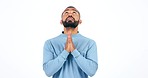 Hands, man and praying in studio with anxiety for news, results or lottery, competition or feedback on white background, Prayer, hope and nervous guy model with emoji for good luck, outcome or review