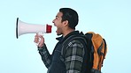 Man, megaphone and shouting with backpack in protest, voice or announcement against a studio background. Profile of male person or activist screaming in bullhorn or loudspeaker for alert on mockup