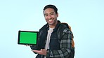 Happy asian man, tablet and palm with green screen or mockup in advertising against a studio background. Portrait of male person smile with like emoji, OK or yes sign for technology, app or display