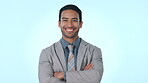 Happy businessman, arms crossed and professional in management against a studio background. Portrait of asian man or employee smile in business, career ambition or positive mindset on mockup space