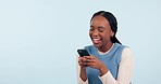 Woman, laugh and typing with phone in studio, reading social media and funny digital notification on white background. Smartphone, african model and search meme, download mobile app and mockup space