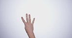 Hand, counting and person in studio with mockup space for advertising, promotion or marketing. Fingers, closeup and man model with mathematics numbers gesture for empty mock up by white background.