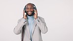 Headphones, music and business man in studio listening to song, audio and radio on commute. Relax, happy and portrait of African worker streaming track for working, career and job on gray background