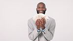Money, finance and a man lottery winner in studio on a white background with cash, bonus or salary increase. Portrait, smile and business with a happy employee excited by financial investment success