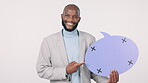 Black man, speech bubble and pointing at banner in studio for marketing and advertising with smile and mockup space. Professional person, communication and tracking marker for product placement 