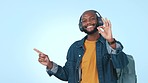 Black man, student and pointing on mockup for list or subject in a studio background with smile. Portrait, education and happy person with backpack show notification or information for advertising 