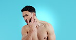 Face touch, beard and skincare of man in studio isolated on a blue background mockup space. Portrait, natural beauty and model grooming for facial cosmetic, dermatology and healthy skin treatment