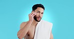 Face, skincare and man with cotton in studio for dermatology, cosmetics or wellness on blue background. Portrait, cleaning and male model with beauty pad for swab application, toner or facial cleanse