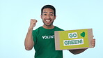 Go green, poster for recycling and volunteer man on blue background in studio to promote ecology on earth day. Portrait, smile and environment for global warming, climate change or sustainability