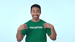 Man, volunteer and invitation to join, smile and welcome to studio isolated on a blue background mockup space. Portrait, charity and happy person invite to community service, calling and recruitment