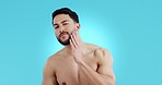Hands on face, beard and skincare of man in studio isolated on a blue background mockup space. Portrait, natural beauty touch and model grooming for facial, dermatology and healthy skin treatment