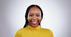 Happy, face and black woman in studio laughing at comic, joke or positive attitude on grey background. Smile, portrait and African lady model with good mood, silly of funny reaction, free or vibe 