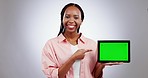 Woman, presentation and tablet green screen for e learning, online education or promotion in studio. Face of African student with digital news, study results and tracking marker on a white background