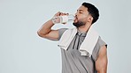 Fitness, drinking water and face of man in workout, training or exercise in studio isolated on white background mockup space. Portrait, liquid hydration and thirsty athlete, healthy body and wellness