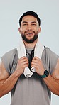 Fitness, face and happy man with towel in studio for training, exercise and health goals on grey background. Gym, portrait and personal trainer smile after sports, workout or performance challenge