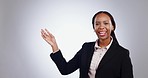 Black woman, presentation and business news with information, face and communication with pointing on white background. Portrait, announcement and mockup space with corporate speaker in a studio