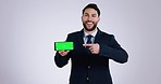 Face, business man or green screen of phone for advertising space, sign up offer and tracking markers in studio. Happy arab worker, portrait and pointing to mobile, news or mockup on white background