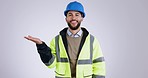 Face, construction and man in studio advertising mockup space, engineering announcement or information on white background. Portrait, arab contractor and architect show presentation, ads or promotion