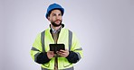 Search, thinking and man engineer with tablet planning construction project isolated in a studio white background. Ideas, professional and architecture worker with internet, software or online app