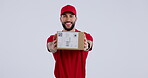 Portrait, delivery man and courier giving a box, package and online shopping product to customer in studio white background. Mail, service and worker in supply chain, distribution and shipping 