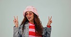 Fashion, sunglasses and woman in studio with peace sign and smile with trendy accessories. Emoji, hand gesture and portrait of happy person with style, casual clothes and outfit on gray background