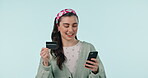 Smile, phone and credit card with a woman customer in studio on a blue background for bank payment. Fintech, ecommerce or online shopping with a young person using a mobile for retail or accounting