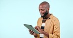 Happy black man, tablet and research in social media or networking against a studio background. African male person smile with technology for online search, website or browsing app on mockup space