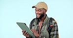 Adventure, tablet and man with a backpack in a studio typing a text message on the internet. Smile, trekking and African male hiker doing research for a camp on digital technology by white background