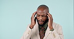 Businessman, black man and headache in studio with pain and burnout from corporate job and mental health. Face, person and stress with anxiety and brain fog from audit career on blue background