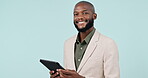 Tablet, smile pr planning with a business black man in studio on blue background for networking. Portrait, research or email communication with a happy young employee scrolling online for information