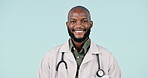 Face, happy black man and doctor in studio isolated on a blue background mockup space. Portrait, smile and African medical professional employee, expert surgeon and healthcare worker in Nigeria.