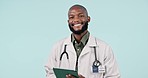 Tablet, smile and face of man doctor in a studio doing research for medical treatment with pride. Happy, technology and portrait of African healthcare worker working for diagnosis by white background