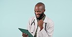 Celebration, tablet and man doctor in a studio with fist pump for success, winning or achievement. Happy, smile and African healthcare worker on digital technology for job promotion or good news.