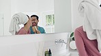 Brush, singing and young couple in the bathroom doing a self care, clean and shower routine. Morning, karaoke and happy man and woman dancing, bonding and having fun for body treatment in modern home