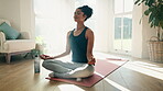 Woman, lotus pose and meditation with yoga for fitness at home, mindfulness with zen, calm and spiritual. Breathing, peace and exercise in living room, health and wellness for healing and self care